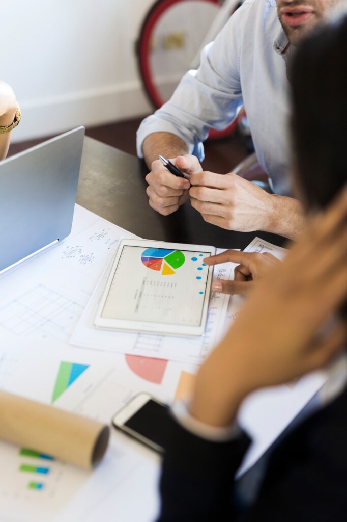 Business people analyzing data in office
